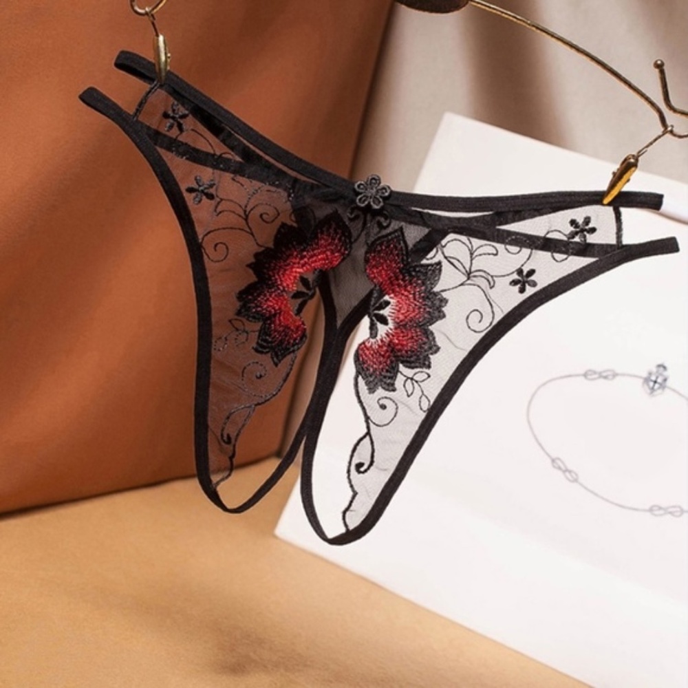 A Black beautifully embroidered Crotchless G string / Thong.